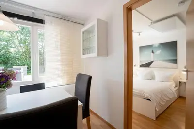 Ein Bett oder Betten in einem Zimmer der Unterkunft ERL12 Ferienhaus Niendorf Ostsee