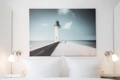 Ein Bett oder Betten in einem Zimmer der Unterkunft ERL12 Ferienhaus Niendorf Ostsee