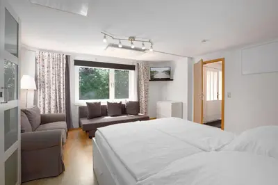 Ein Bett oder Betten in einem Zimmer der Unterkunft ERL12 Ferienhaus Niendorf Ostsee