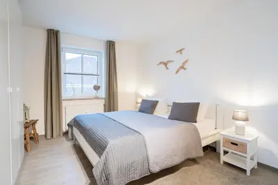 Ein Bett oder Betten in einem Zimmer der Unterkunft GAR4b Appartementhaus 