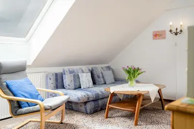 Ein Sitzbereich in der Unterkunft HER14a Ferienwohnung Hartig