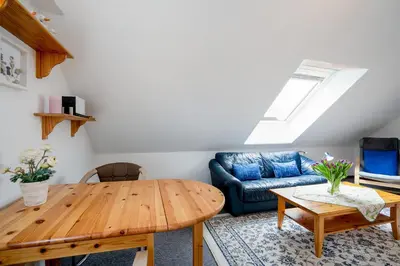 Ein Sitzbereich in der Unterkunft HER14b Ferienwohnung Hartig