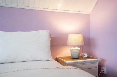 Ein Bett oder Betten in einem Zimmer der Unterkunft HER16c Ankes Gästehaus F