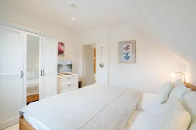 Ein Bett oder Betten in einem Zimmer der Unterkunft HER16d Ankes Gästehaus F