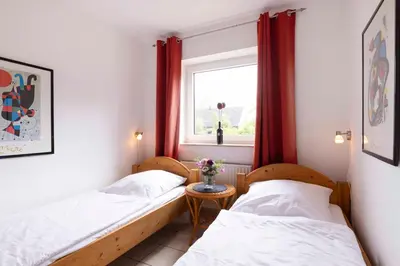 Ein Bett oder Betten in einem Zimmer der Unterkunft MEI37 Ferienwohnung Krüger