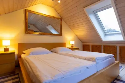 Ein Bett oder Betten in einem Zimmer der Unterkunft MEI6 Ferienwohnung Passat