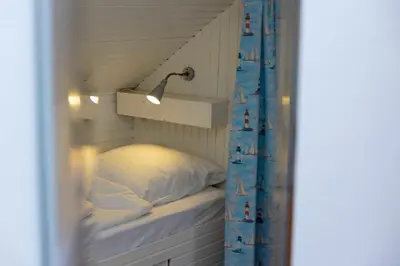 Ein Bett oder Betten in einem Zimmer der Unterkunft MEI6 Ferienwohnung Passat