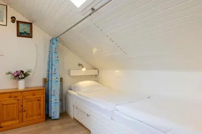 Ein Bett oder Betten in einem Zimmer der Unterkunft MEI6 Ferienwohnung Passat