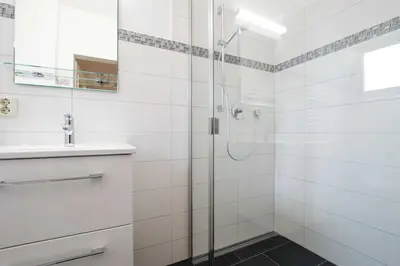Ein Badezimmer in der Unterkunft MEI77 Ferienwohnung Zimmermann F
