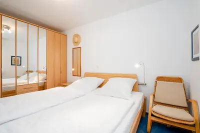 Ein Bett oder Betten in einem Zimmer der Unterkunft OST1 Ferienwohnung Lörper