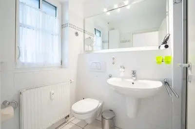 Ein Badezimmer in der Unterkunft OST1 Ferienwohnung Lörper