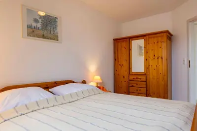 Ein Bett oder Betten in einem Zimmer der Unterkunft OST10b Ferienwohnung Musik-Jischa