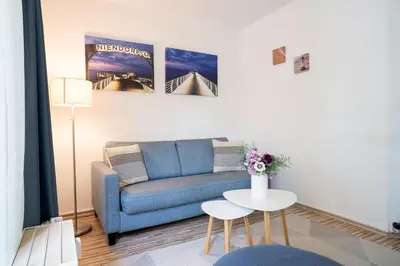 Ein Sitzbereich in der Unterkunft Ost11a Ferienwohnung Strandnah