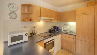 Küche/Küchenzeile in der Unterkunft OST16 Ferienwohnung Wackerow