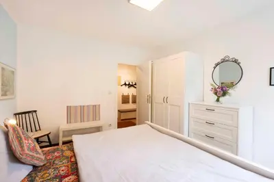 Ein Bett oder Betten in einem Zimmer der Unterkunft PAR1c Ferienwohnung Wessling F