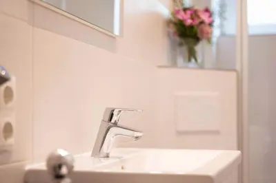 Ein Badezimmer in der Unterkunft PAR1c Ferienwohnung Wessling F