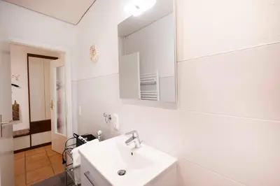 Ein Badezimmer in der Unterkunft PAR1c Ferienwohnung Wessling F