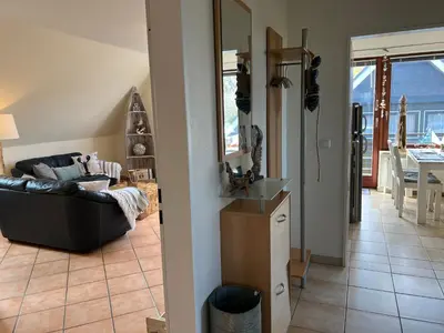 Ein Sitzbereich in der Unterkunft STOE12a Ferienhaus Sonne, Wohnung Sonnenaufgang