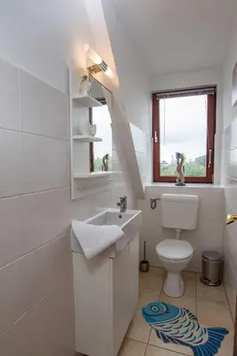 Ein Badezimmer in der Unterkunft STOE12a Ferienhaus Sonne, Wohnung Sonnenaufgang