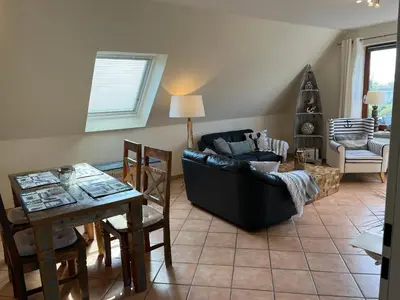 Ein Sitzbereich in der Unterkunft STOE12a Ferienhaus Sonne, Wohnung Sonnenaufgang