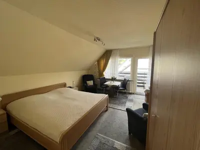 Ein Bett oder Betten in einem Zimmer der Unterkunft STOE14c Gästehaus Iden, App 1