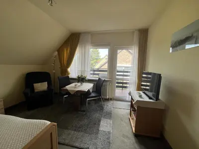 Ein Sitzbereich in der Unterkunft STOE14c Gästehaus Iden, App 1