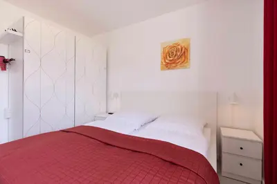 Ein Bett oder Betten in einem Zimmer der Unterkunft STR123L Ferienwohnung Sarah