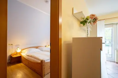 Ein Bett oder Betten in einem Zimmer der Unterkunft STR47a Ferienwohnung Heitmann