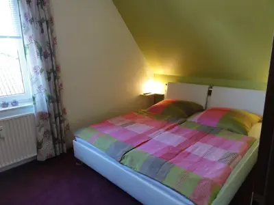 Ein Bett oder Betten in einem Zimmer der Unterkunft STR74b Ferienwohnung Sevimli