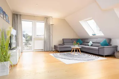 Ein Sitzbereich in der Unterkunft STR92b Ferienwohnung Strandzeit F