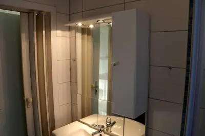 Ein Badezimmer in der Unterkunft STR81a Ferienwohnungen Steinmetz- Seeseite