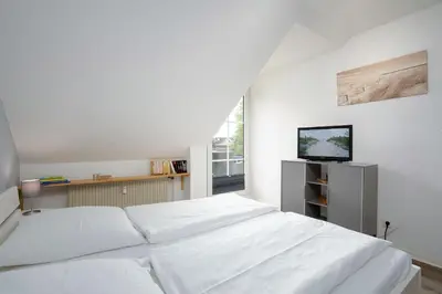 Ein Bett oder Betten in einem Zimmer der Unterkunft TRA7 