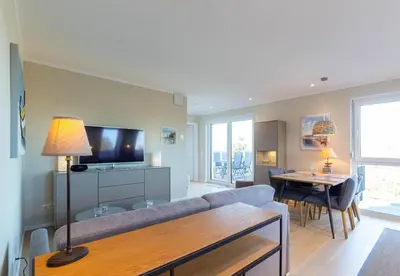 TV/Unterhaltungsangebot in der Unterkunft Ferienwohnung Beachbreak - Stilvolle Ferienwohnung an der Ostsee
