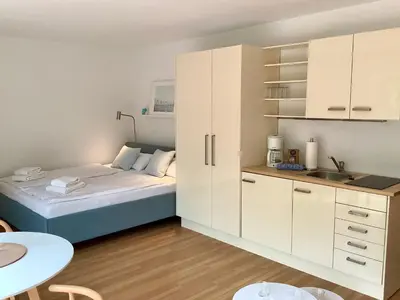 Ein Bett oder Betten in einem Zimmer der Unterkunft Haus Falkenweg 5 Kleine Ruhe Oase