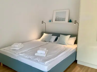 Ein Bett oder Betten in einem Zimmer der Unterkunft Haus Falkenweg 5 Kleine Ruhe Oase
