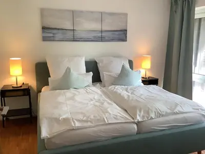 Ein Bett oder Betten in einem Zimmer der Unterkunft Haus Falkenweg 5 Ruhe Oase