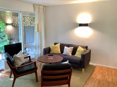 Ein Sitzbereich in der Unterkunft Haus Falkenweg 5 Ruhe Oase