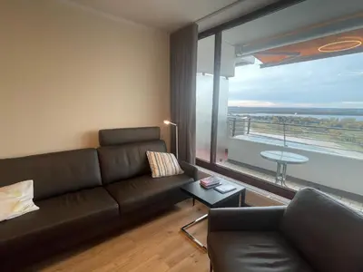 Ein Sitzbereich in der Unterkunft Miramar Meerblick