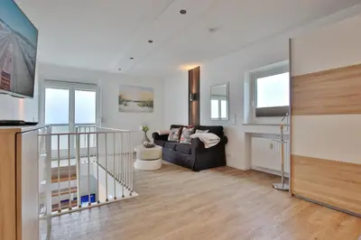 TV/Unterhaltungsangebot in der Unterkunft Haus Miramar TREF Appartement 64