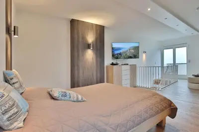 Ein Bett oder Betten in einem Zimmer der Unterkunft Haus Miramar TREF Appartement 64