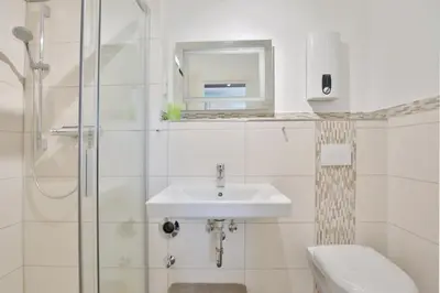Ein Badezimmer in der Unterkunft Haus Miramar TREF Appartement 64