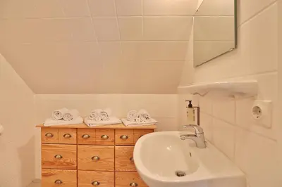 Ein Badezimmer in der Unterkunft Strandduene Stranddüne Appartement 23