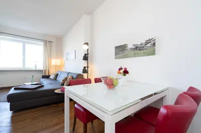Ein Sitzbereich in der Unterkunft Ferienwohnung Capolino