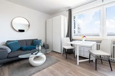 Ein Sitzbereich in der Unterkunft Ferienwohnung Capolino Suite