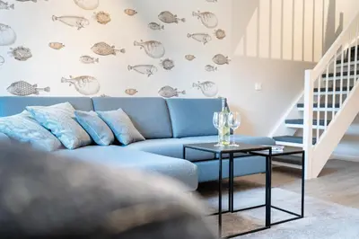 Ein Sitzbereich in der Unterkunft Ferienwohnung Hygge