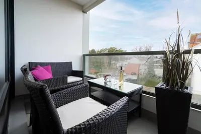 Ein Sitzbereich in der Unterkunft Ferienwohnung Meeresstrand, App 206
