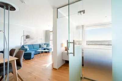 Ein Bett oder Betten in einem Zimmer der Unterkunft Ferienwohnung Nordermole