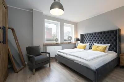 Ein Bett oder Betten in einem Zimmer der Unterkunft Ferienwohnung Puro