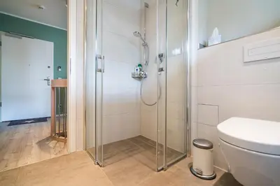 Ein Badezimmer in der Unterkunft Ferienwohnung SuiteBEACH
