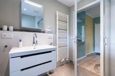 Ein Badezimmer in der Unterkunft Ferienwohnung SuiteBEACH